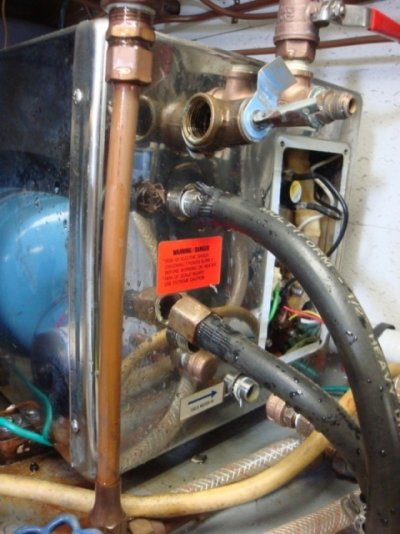 Rusted, leaking Water Heater.JPG