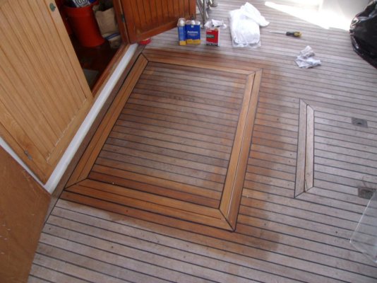 caulking finished, wiped down, ready for hatch pulls and hinge.jpg