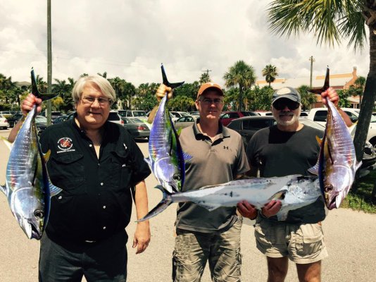 Three guys with fish.jpg