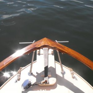 Laminated teak bow rail