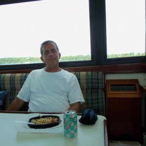 My Dad enjoying a Lean Cuisine at anchor in Manjack Cay