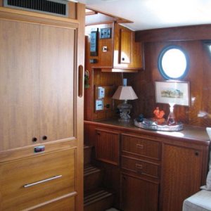 Custom 2 Draw Refrigerator, with pantry above with rollout shelving.