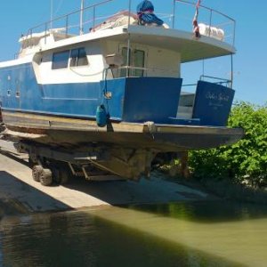 Re floating for the tow after the drug boat arrived from Vancouver Island on a trailer. Only to be towed to the lift for storage on the hard, until th