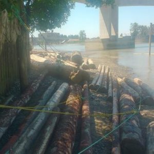 Timber storage at low water.