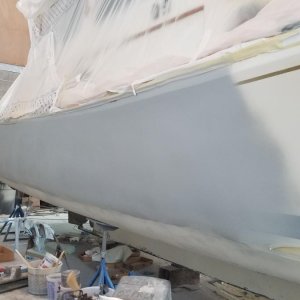 Starboard side re-glassed and ready for fairing.