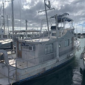 Got all the railings repaired as well as all the rear Bimini removed and the mast up with radar working.