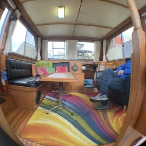 Fish-eye and rainbow carpet in the salon.