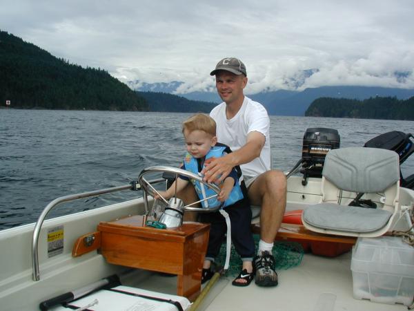 2003, first time driving a boat! - for him ;)
