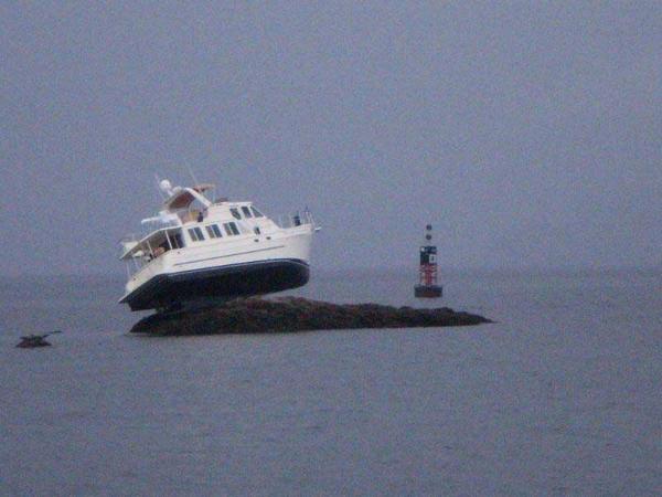 My current boat when it was new and named "Dream Weaver".  The new owner found this handy rock at high tide.