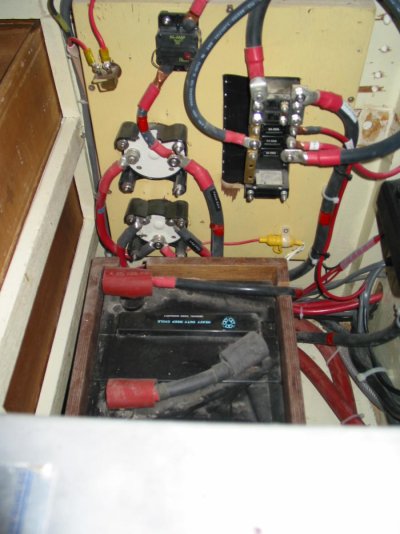 large 12v breakers, starting agm batt, and switches under msr berth.jpg