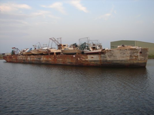 Bargeload of damaged boats Chalmette.jpg