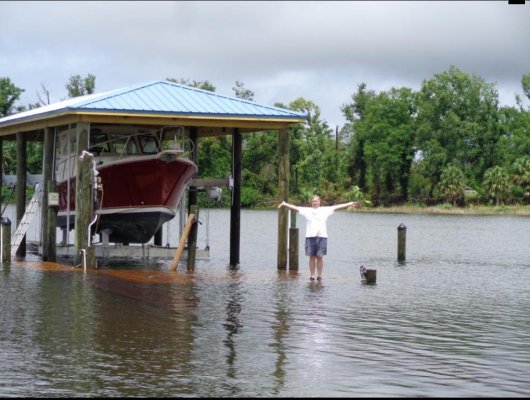 Rich Gano at his flooded dock.jpg