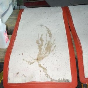 This is the non-woven pad under each heating / vacuum pad. You can see where the uncured resin is pulled out.