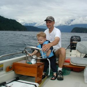 2003, first time driving a boat! - for him ;)