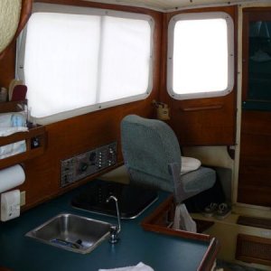 port windows with sunbrella interior covers (curtains)