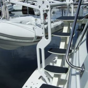 Custom stairs and custom dingy davits on extended swim grid