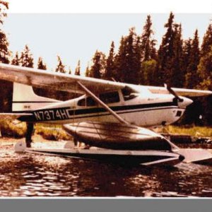 Hauling a canoe on the float of my C-185
Kenai, Alaska 1977