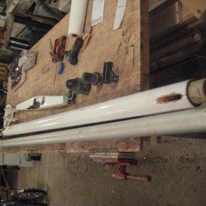 The original mast has been dissassembled. One idea for a replacement mast is this tube on the left which was some sort of spinnaker pole. Sadly, the O