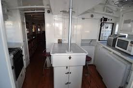 Galley aft of vessel right below the pilot house.
Engine is inside the center counter