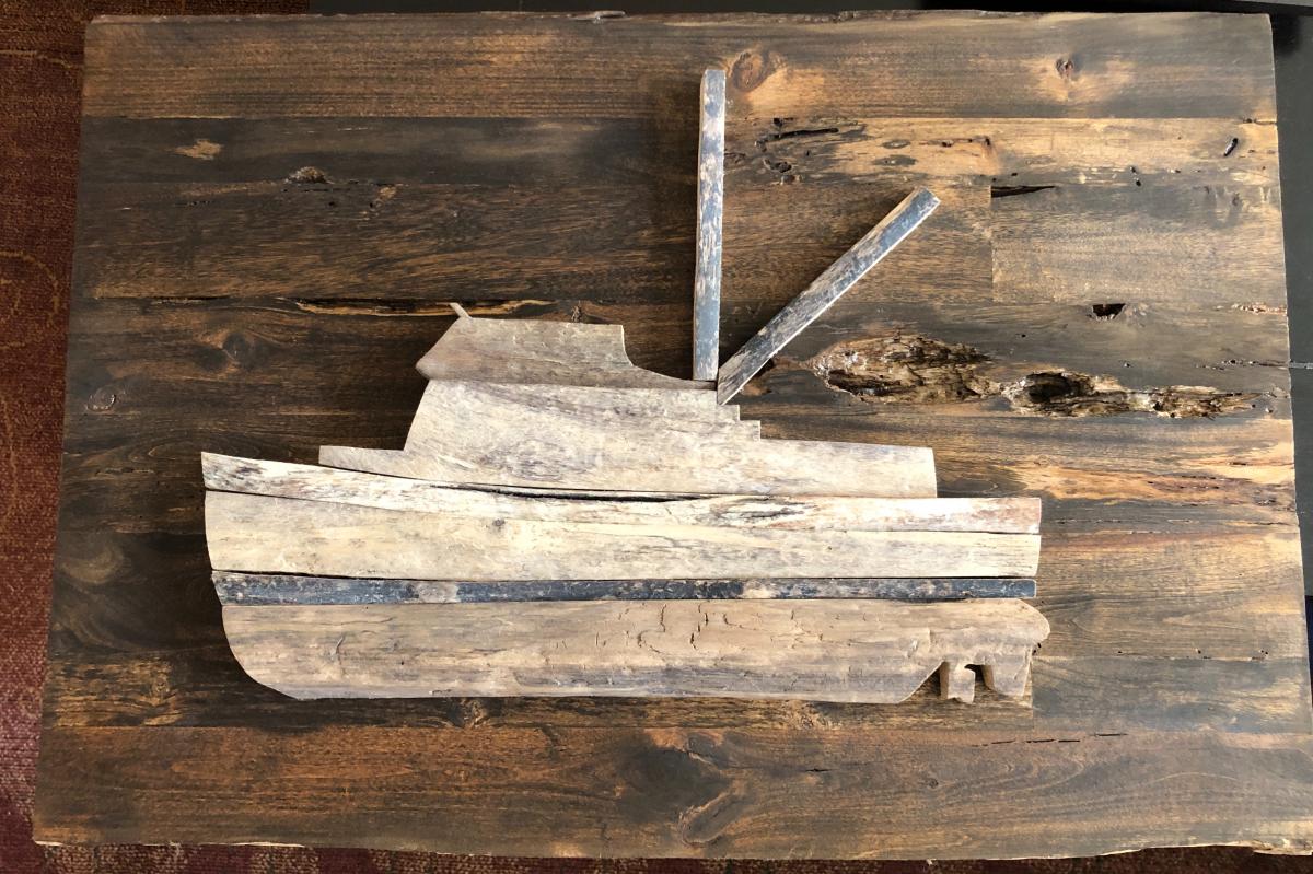 One of my sons collected driftwood at our harbor, Lake Pepin (Upper Mississippi River). He found a Graving plan of our Grand Banks36 & using driftwood