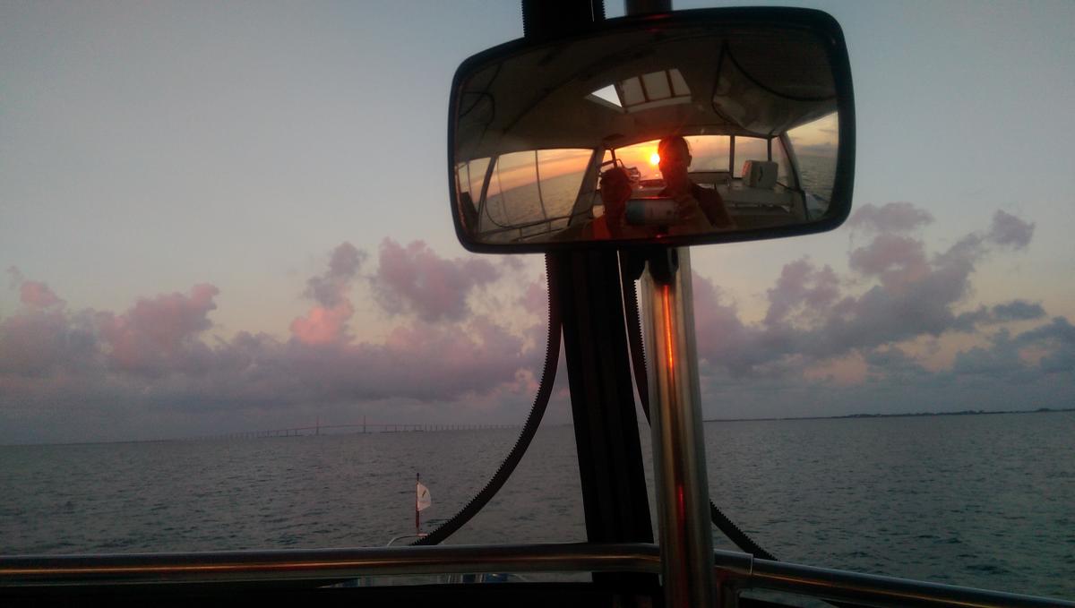 Skyway on the bow and a sunrise on the stern (St. Pete)