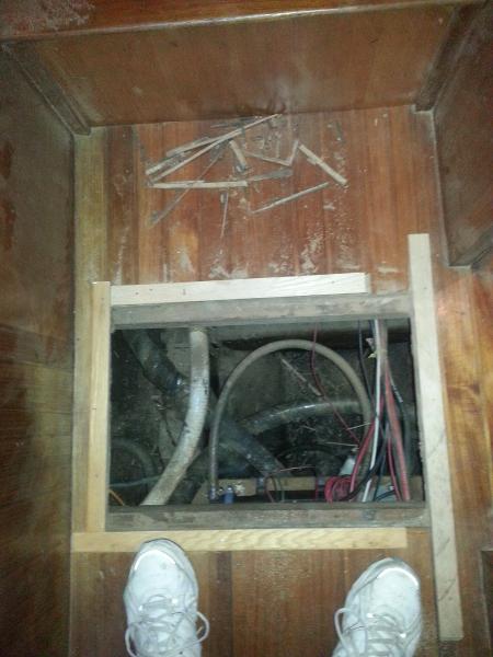 Then it was done.  You can see how small the trim pieces are.  You can also see all the crap in the bilge.  It was just dark and scary before.  Now it