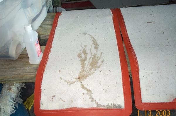 This is the non-woven pad under each heating / vacuum pad. You can see where the uncured resin is pulled out.